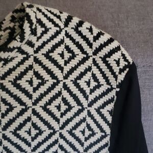 Chico's top women’s size large (12) white black texture Sheer Sleeve